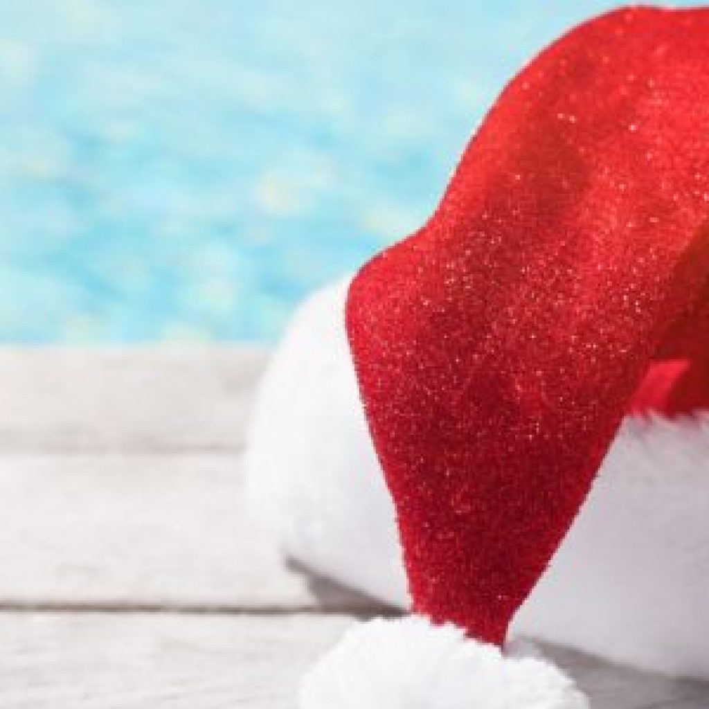 red christmas hat sitting by pool