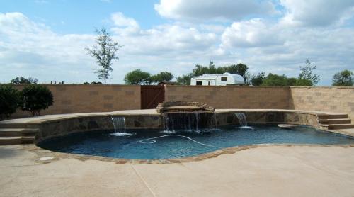 swimming pool surrounded by cement blocks